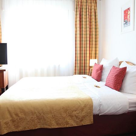 Cityhotel Amadeus Munique Quarto foto